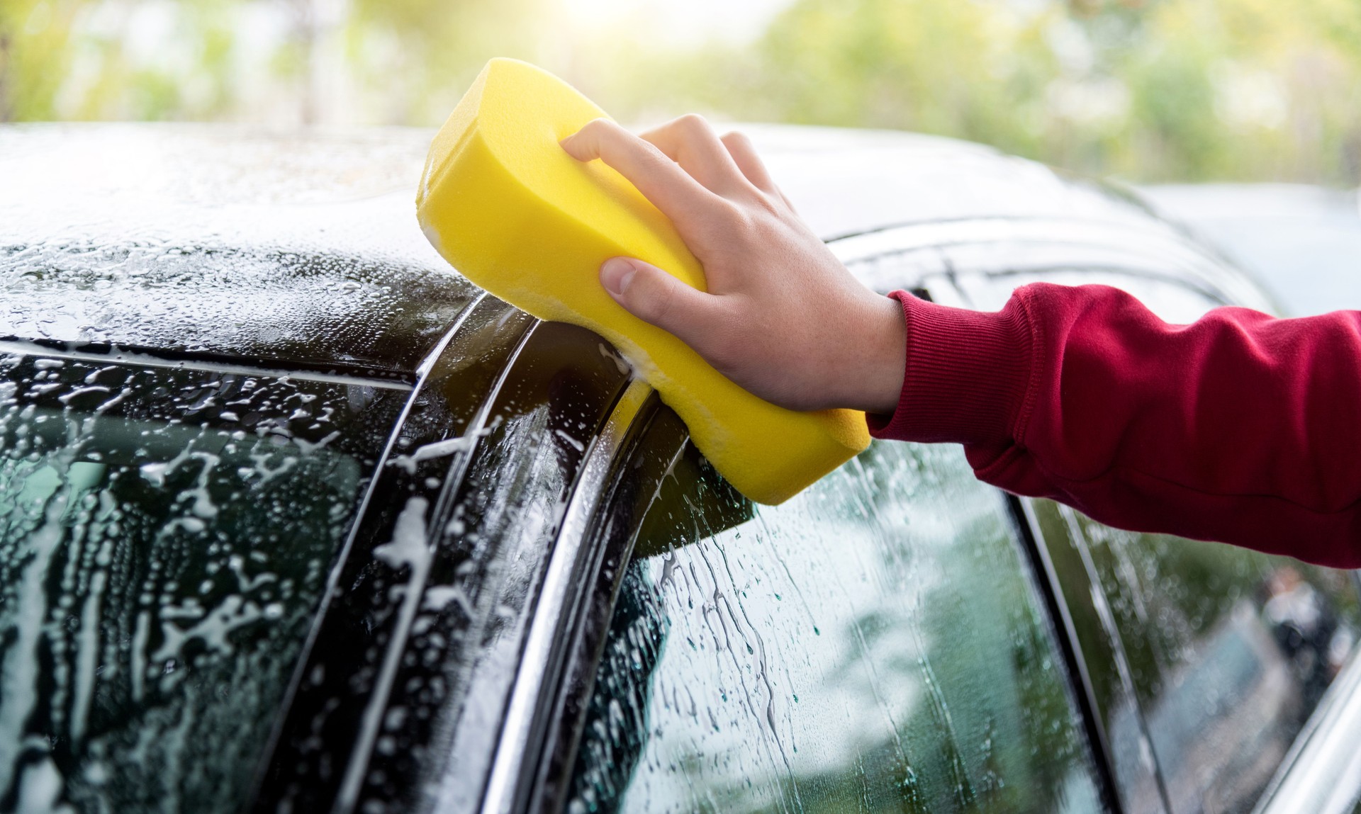 Hand hold sponge clean the car